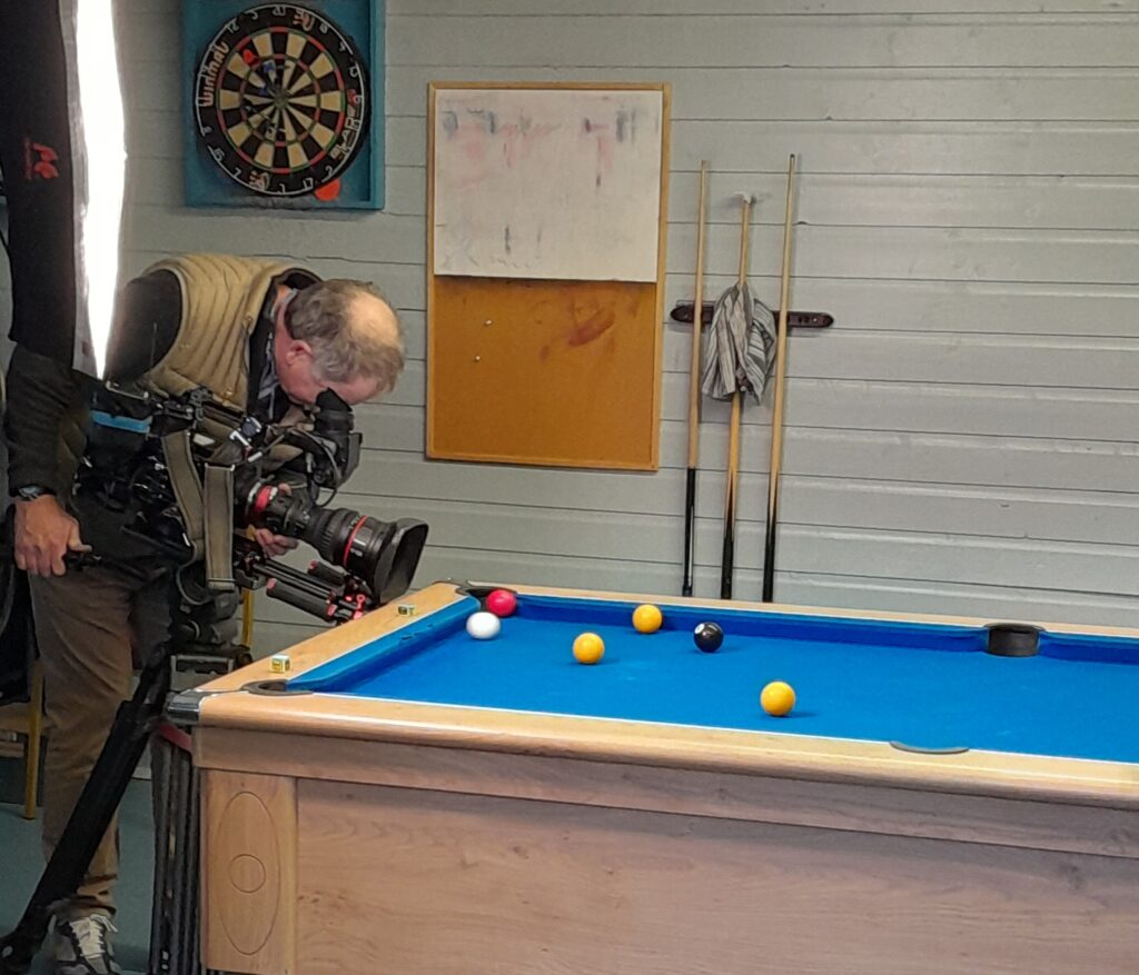 Film crew filming in the games room at our Dudley treatment centre as part of a current affairs show on gambling