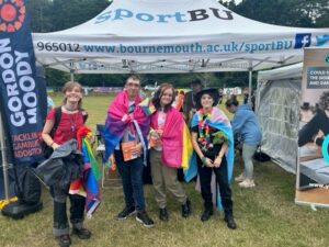 Bournemouth Pride 2023 attendees with Gordon Moody LGBTQ+ leaflets.